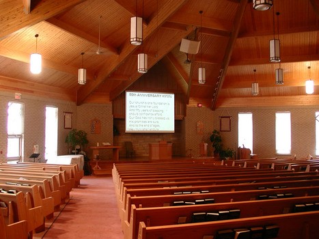 House of Worship with ceiling mounted projector and electric projection screen