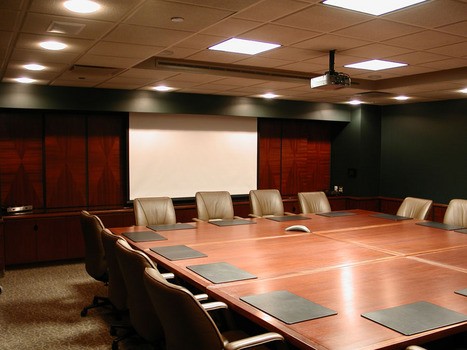 Boardroom Installation with ceiling mounted projector and recessed electric screen